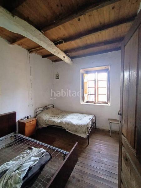 Foto f8d8c072-f2b4-4986-bb6f-613bea47f7c6. Casa en Pedrafita do Cebreiro