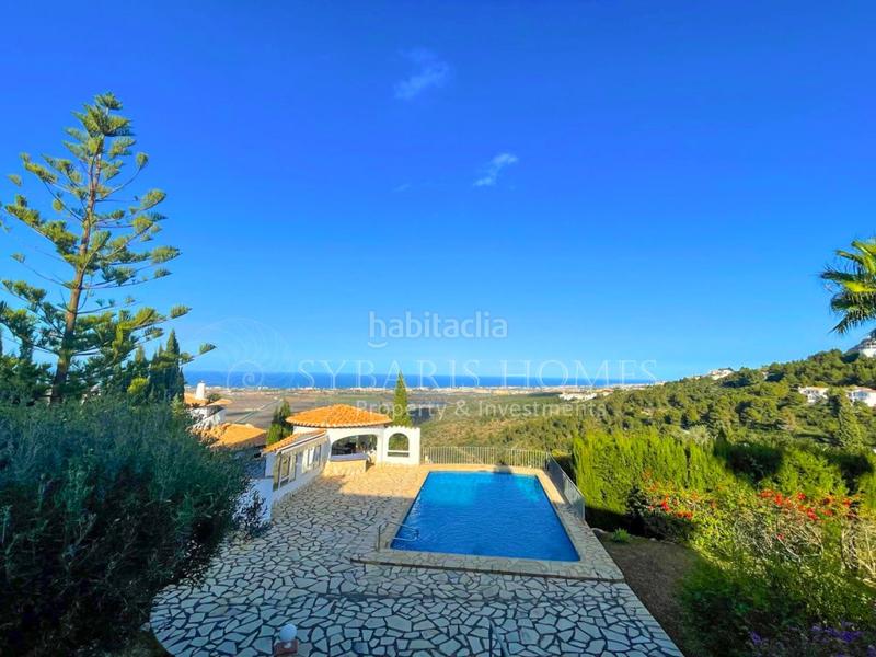 Foto 7ca2c79d-d90e-409a-ae1b-fa32e5050b5c. Chalet  en monte con vistas al mar en Pego