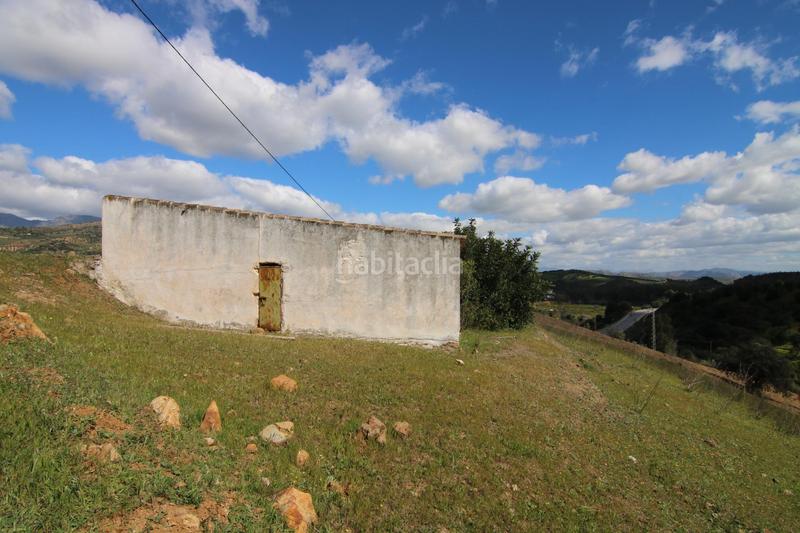 Foto 0b3eb750-b9ad-43cc-b290-6e37ebd48273. Masía terreno rústico con vivienda en Guaro
