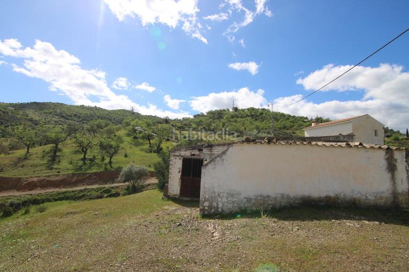 Foto c9093fea-5905-4f2b-ac11-ecb2a668c00e. Masía terreno rústico con vivienda en Guaro