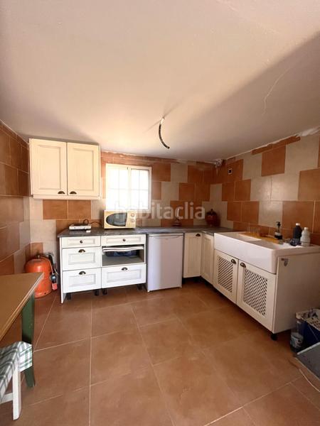 Foto d7b5249d-7c65-47cb-aa7f-4221895e6e05. Masía terreno rústico con vivienda en Guaro