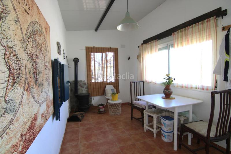 Foto da0dec70-e427-48d8-8dd9-4550fc574b7d. Masía parcela rural con casa, almacen y alberca. en Coín
