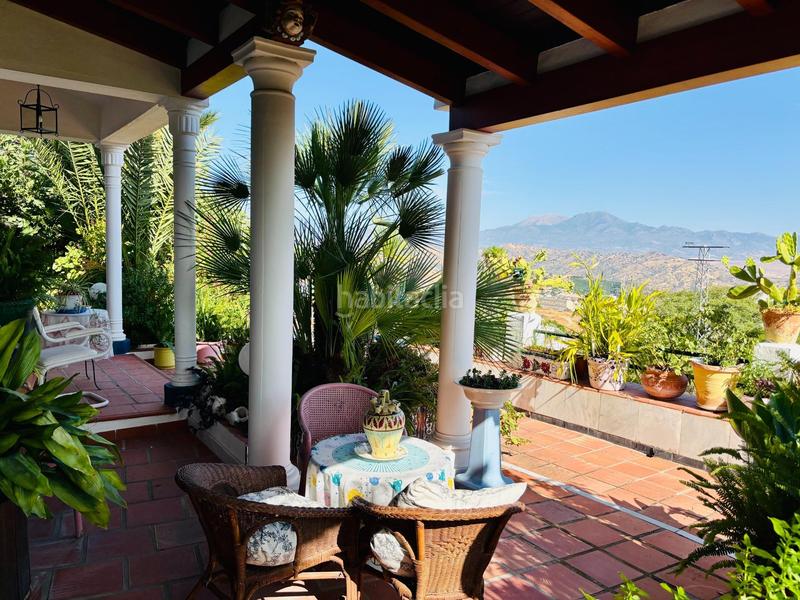 Foto 750802d1-e7fc-46a3-b1d7-c3343f58b342. Chalet mit parking in Coín