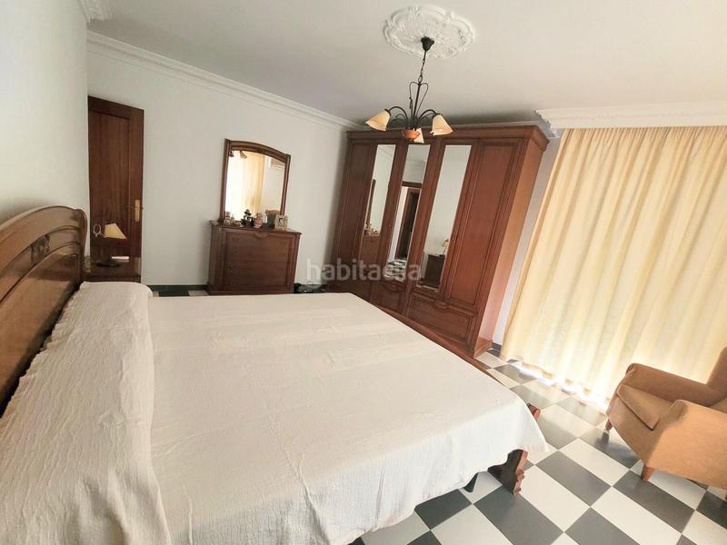 Foto b8b791bc-e534-433a-b9cd-e888cb76ab04. Casa adosada casa en venta lista para entrar a vivir 160 m2 construidos, terraza y plaza de aparcamiento en Coín