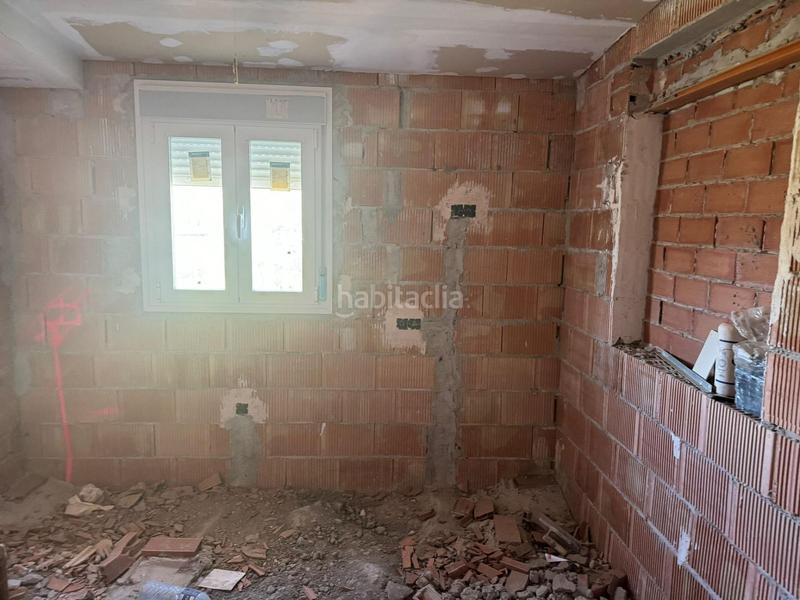 Foto 814d472c-31a2-4bcf-97f5-c2dbd36dafba. Maison avec parking dans Coín