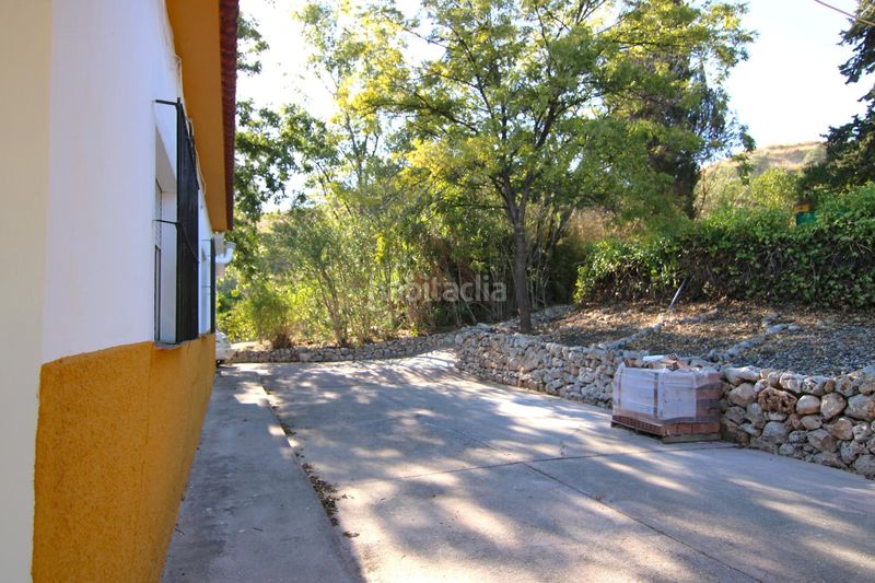 Foto f98fcb44-8767-4413-bc6c-cf8688cf2e36. Masia amb aparcament a Álora