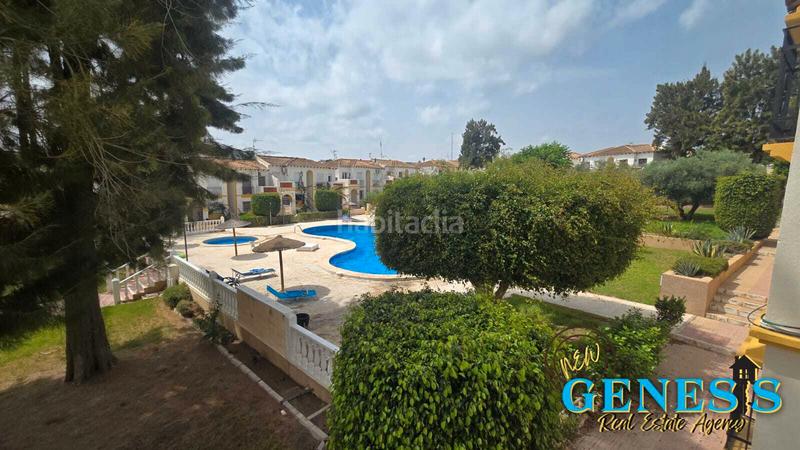 Foto 557f830f-e732-4dba-8f58-6f1e4f7a5a37. Piso en calle los rosales 19 ¡oportunidad con encanto en villamartin! – 38m² con terraza y piscina comunitaria en San Miguel de Salinas
