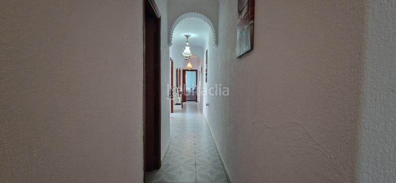 Foto abc8650a-cd30-42a4-9a91-1bb41482c7a6. Casa adossada amb calefacció a El Rompido