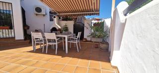 Casa adosada en El Portil. Exclusivo chalet adosado de esquina con vistas a la laguna y a p