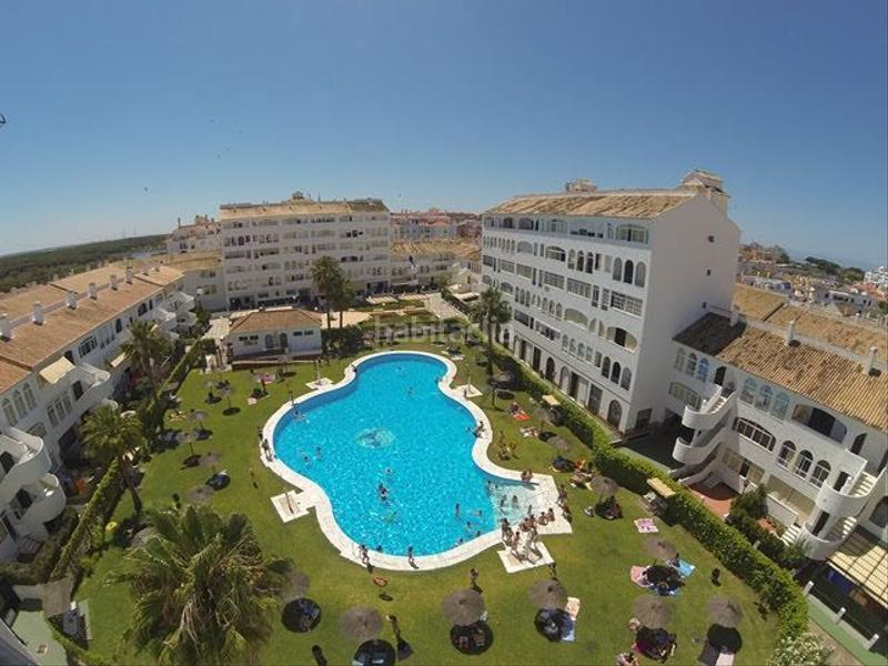 Foto 40433c94-6336-46f8-bb33-9a9d808eb528. Apartamento piso en venta complejo residencial con piscina y jardines en El Portil