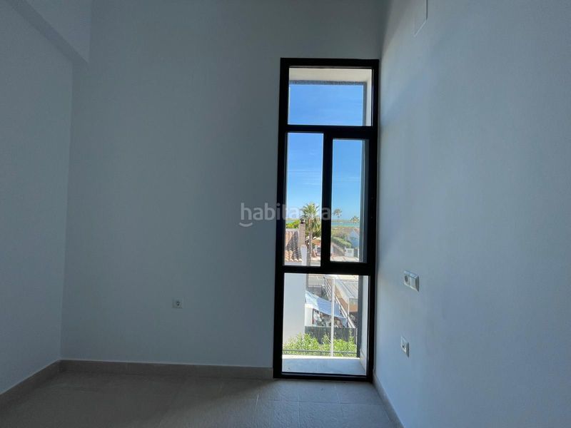 Foto 15a4232f-b086-4d89-a34f-fc416ddc5d0f. Casa adossada amb aparcament a El Rompido