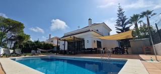 Casa en El Portil. Exclusivo chalet con piscina privada en parcela de 780m en nuevo