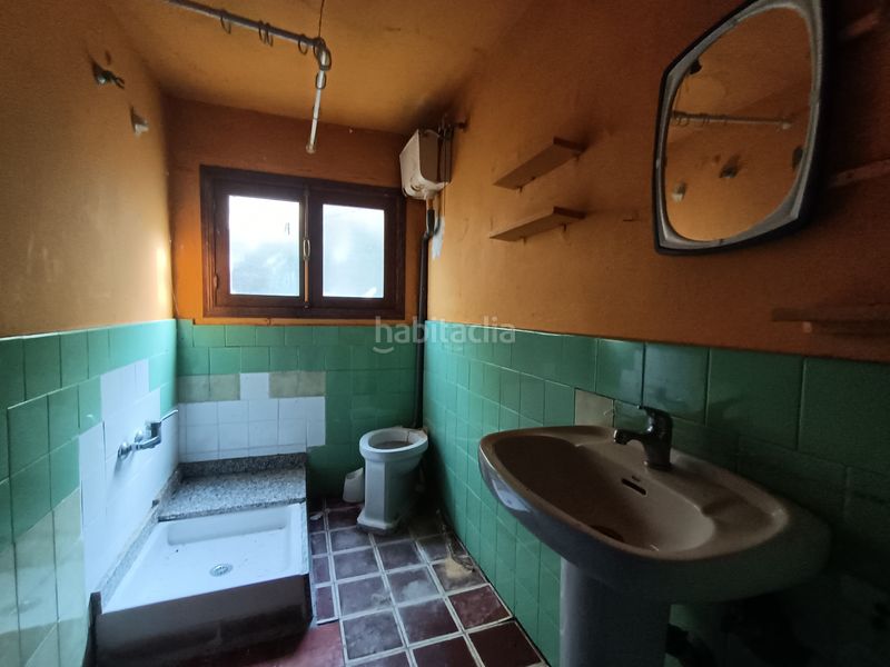 Foto 97b7340a-9dd3-44ea-814c-428df5aadd28. Casa adossada a avenida covadonga 4 a Cangas de Onís
