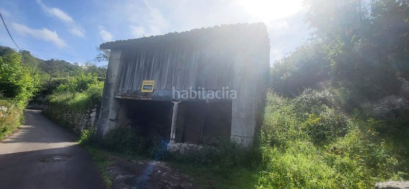 Foto 400df754-49a6-4f0e-a632-b9217384dbe0. Edificio en lugar puertas 1 en Cabrales