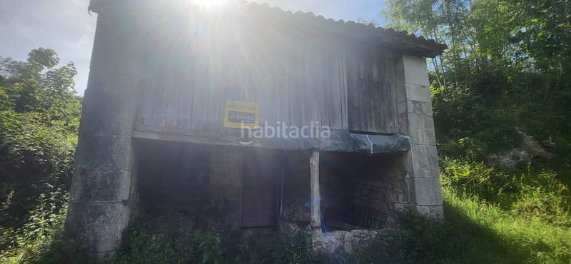 Foto c1585185-f2bf-40a7-a4dd-bdb7a6a238c6. Edificio en lugar puertas 1 en Cabrales
