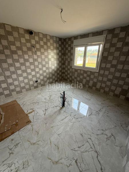 Foto a29e0d1d-efe8-430f-88e8-fa9826856514. Chalet  en venta en pueblo, 4 dormitorios. en Meruelo