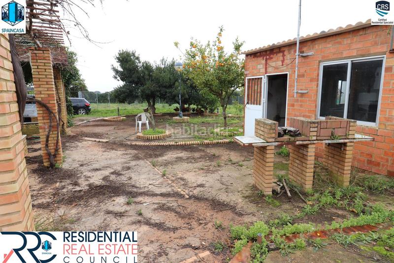 Foto 54de34de-3dec-49d0-86de-89840c3c5fd6. Chalet with fireplace heating parking pool in Gibraleón