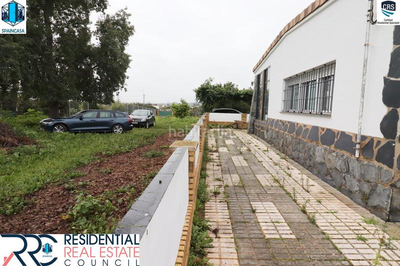 Foto 5ec166c3-c74c-4d89-8318-0490ea488866. Chalet with fireplace heating parking pool in Gibraleón