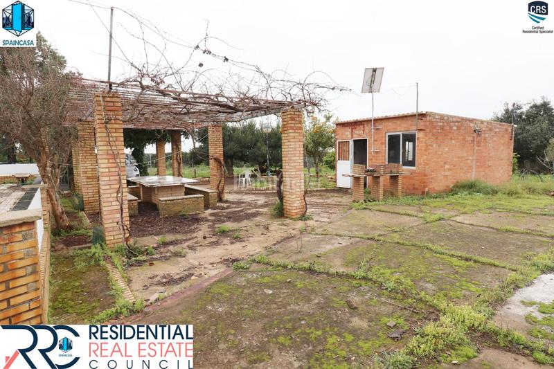 Foto 8ea82886-d9eb-4ade-8098-9521d55f7de3. Chalet with fireplace heating parking pool in Gibraleón