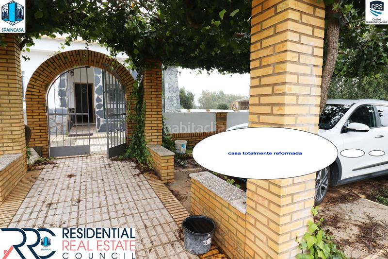 Foto e2e1d592-a504-4c47-b956-699b532a8758. Chalet with fireplace heating parking pool in Gibraleón