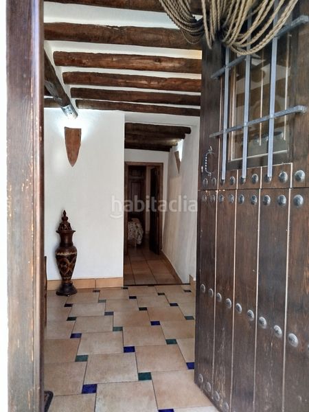 Foto f5a78872-2196-4ada-a45d-515447a8065f. Casa adossada amb xemeneia calefacció a Nevada