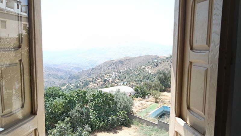 Foto 1192ee1d-1370-4594-a323-77d73ef71679. Casa amb xemeneia a Alpujarra de la Sierra