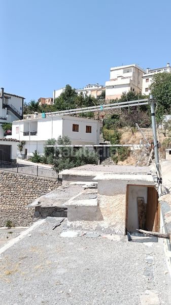 Foto 19a15c6c-2927-4baa-86a1-813c884d914f. Casa amb xemeneia a Alpujarra de la Sierra