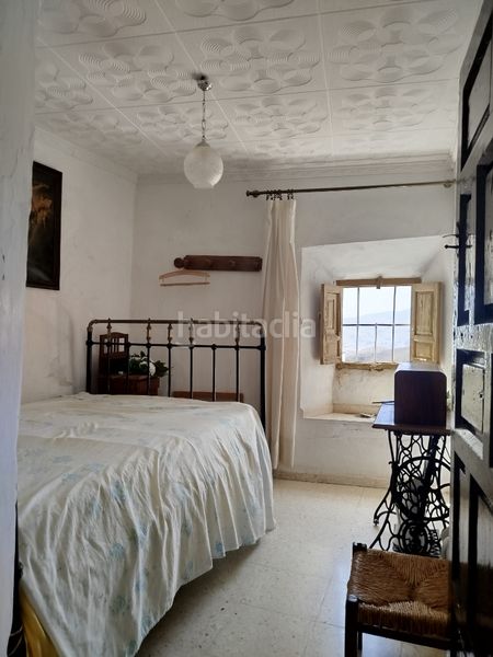 Foto 637d0a85-4aba-45e3-86e0-f595313e26ca. Casa amb xemeneia a Alpujarra de la Sierra