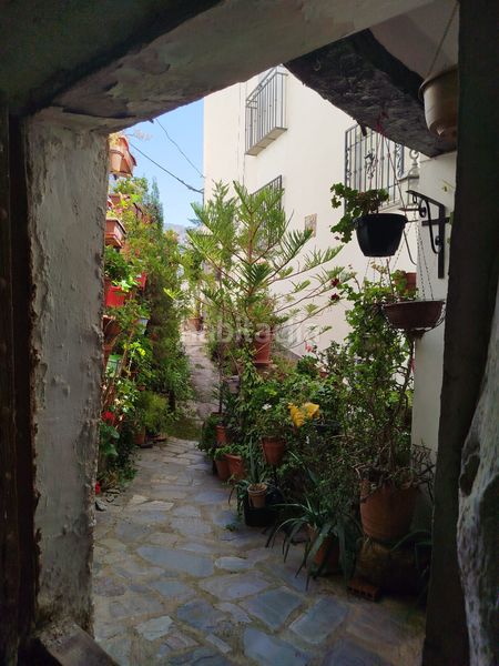 Foto a16838c0-e3d3-4342-bb71-fcc2add587e5. Casa amb xemeneia a Alpujarra de la Sierra