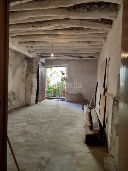 Foto b08f9993-65ea-4864-a45d-08274a0f64c0. Casa amb xemeneia a Alpujarra de la Sierra