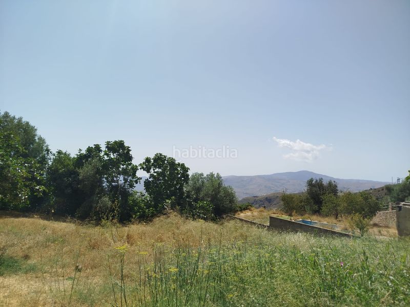 Foto c13b0b30-76de-422a-a9aa-1d71bc371da4. Casa amb xemeneia a Alpujarra de la Sierra
