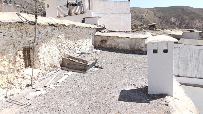 Foto c16fa77d-be2d-4779-a8ec-66d4b520cf37. Casa amb xemeneia a Alpujarra de la Sierra