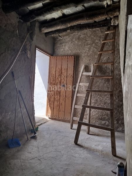 Foto f9e32f50-4cf1-4fb9-b339-757aac4a0772. Casa amb xemeneia a Alpujarra de la Sierra