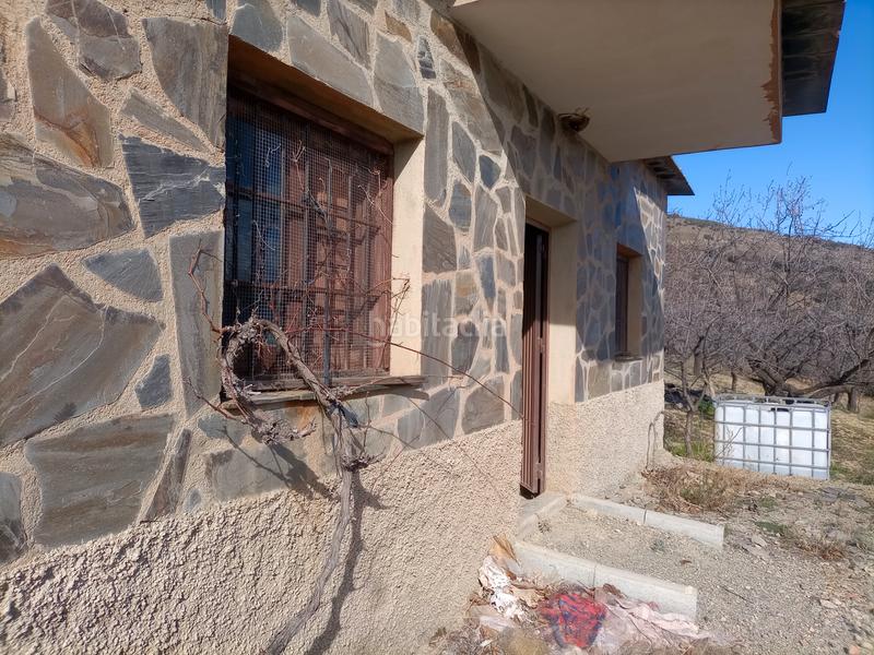 Foto 3a4ae5dc-0edc-4d1e-9c2f-1790e68552c3. Finca rústica terreno con cortijo en mecina bombaron en Alpujarra de la Sierra