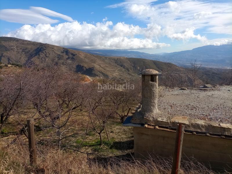 Foto 6b90e247-395e-4bbe-9213-7841d8b76572. Finca rústica terreno con cortijo en mecina bombaron en Alpujarra de la Sierra