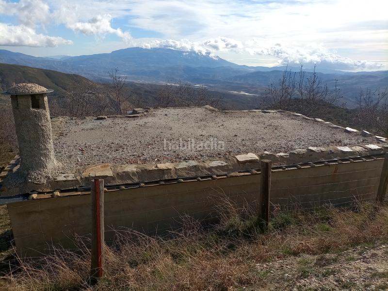 Foto 8138d492-7dd1-47b1-9e27-e2bc068d9faa. Finca rústica terreno con cortijo en mecina bombaron en Alpujarra de la Sierra