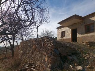 Finca rústica a Alpujarra de la Sierra. Terreno con cortijo en mecina bombaron