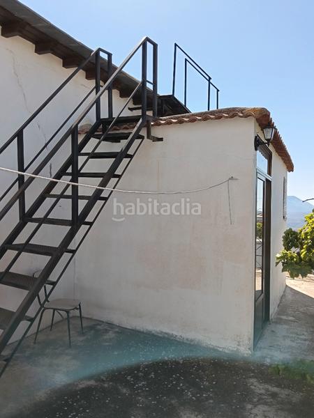 Foto f82ca3ef-b729-469e-bdfc-635bd343af47. Haus in calle carretera 22 in Válor