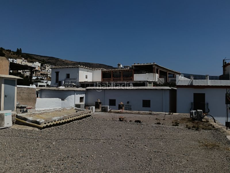 Foto 5f70bf19-9c91-42e6-82ec-a4c6a04b4ae0. Casa amb xemeneia calefacció a Alpujarra de la Sierra