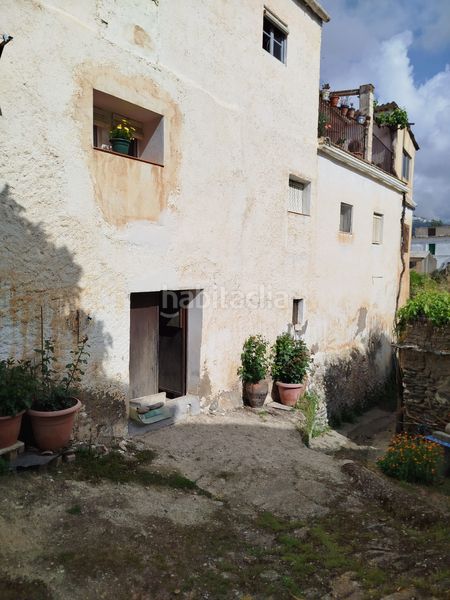 Foto 3bdbf24b-a206-4250-b7a0-5e1b409fadd8. Casa amb xemeneia calefacció aparcament a Cádiar