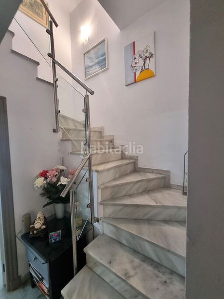 Foto 40df0dc5-1762-4cac-b070-cdc76e8e3be3. Casa adossada amb aparcament piscina a Nueva Atalaya Estepona