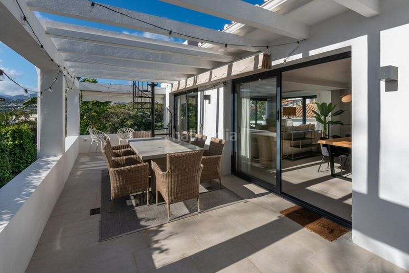 Foto c4cd7354-ee66-44ef-b19a-a598b37d088c. Casa amb aparcament piscina a Las Brisas Marbella