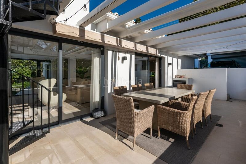 Foto fe3d0428-0f80-450f-84be-dc7ad80a62dc. Casa amb aparcament piscina a Las Brisas Marbella