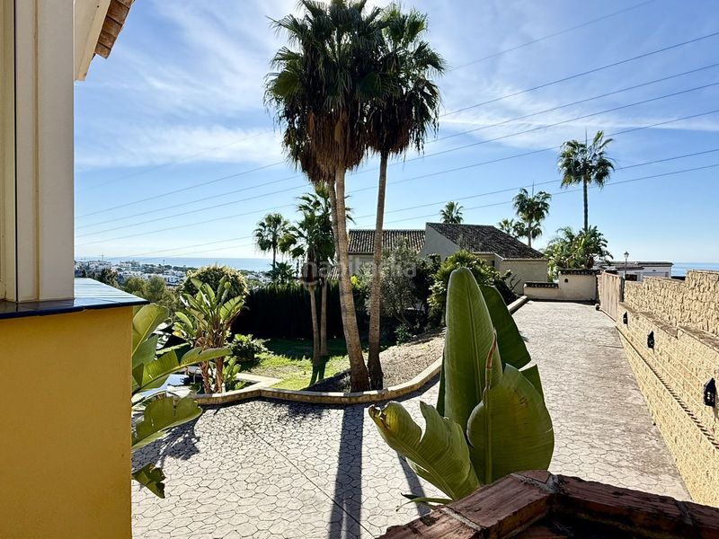 Foto 34ea280d-aedf-48cd-bbdf-56bd93dfc154. Casa amb aparcament piscina a Sierra Blanca Marbella