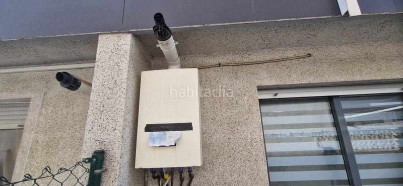 Foto 7c539525-6b7c-47a9-8273-74a32538a724. Casa adossada amb xemeneia calefacció aparcament a Zaragoza