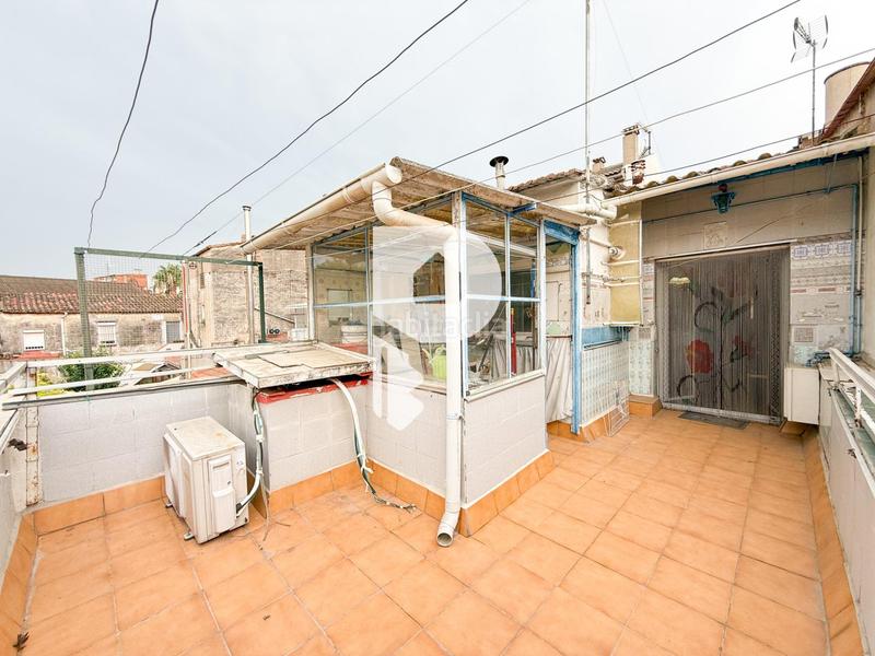 Foto ab0df303-260e-488b-9d3b-ebc9efdfeb94. Casa  en el centro con local en Sant Vicenç dels Horts
