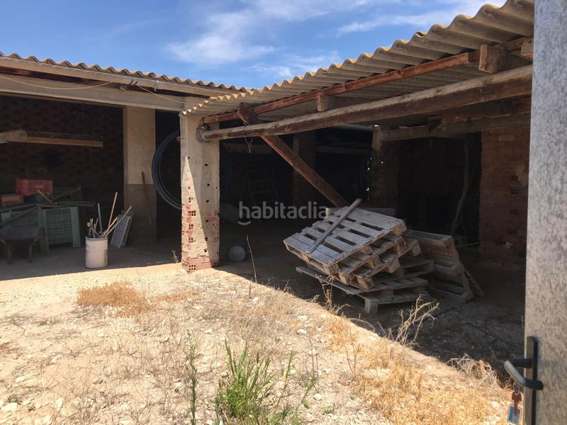 Foto bc9dbf07-8416-47c9-b5ae-8c6ba8f73582. Masia amb xemeneia calefacció aparcament a San Fulgencio