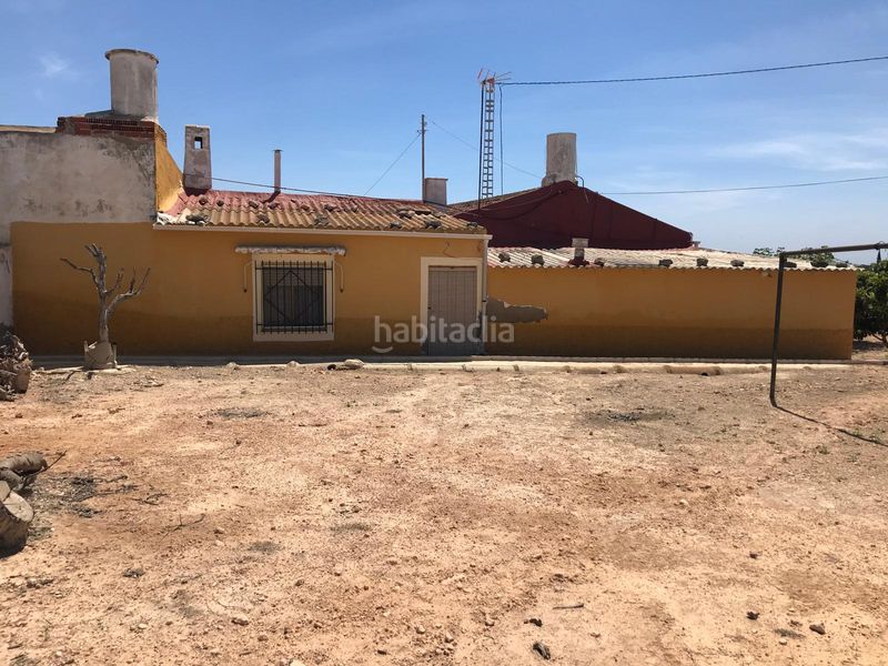 Foto cbdee4b4-7214-473f-9cac-1aa673d4b609. Masia amb xemeneia calefacció aparcament a San Fulgencio