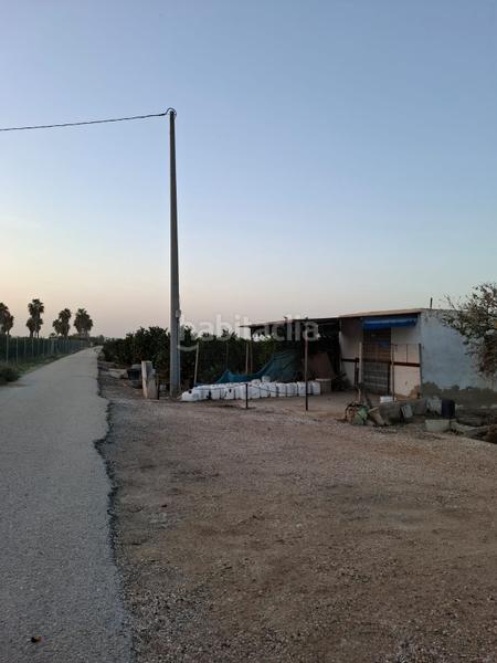 Foto e716a760-b0f8-40b9-98f2-69dfbbc754a2. Rural plot in Puerto Deportivo Guardamar del Segura