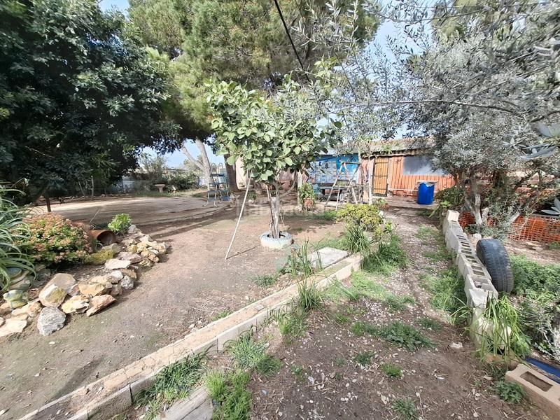 Foto 77494451-bf5e-4f8e-ab2b-1acb76622620. Masia amb xemeneia aparcament a El Edén Guardamar del Segura